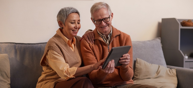 a senior couple contacting their moving company
